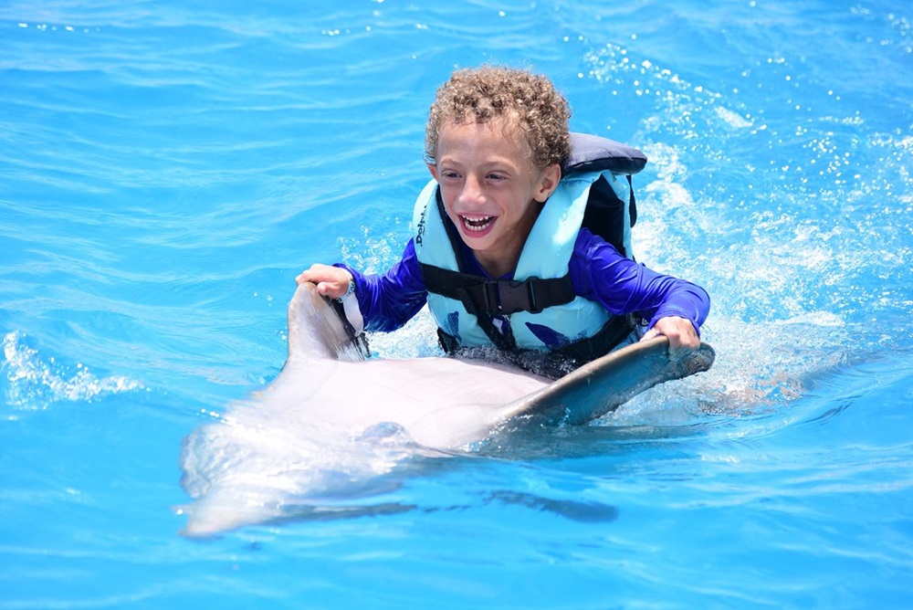 Roberto on a dolphin